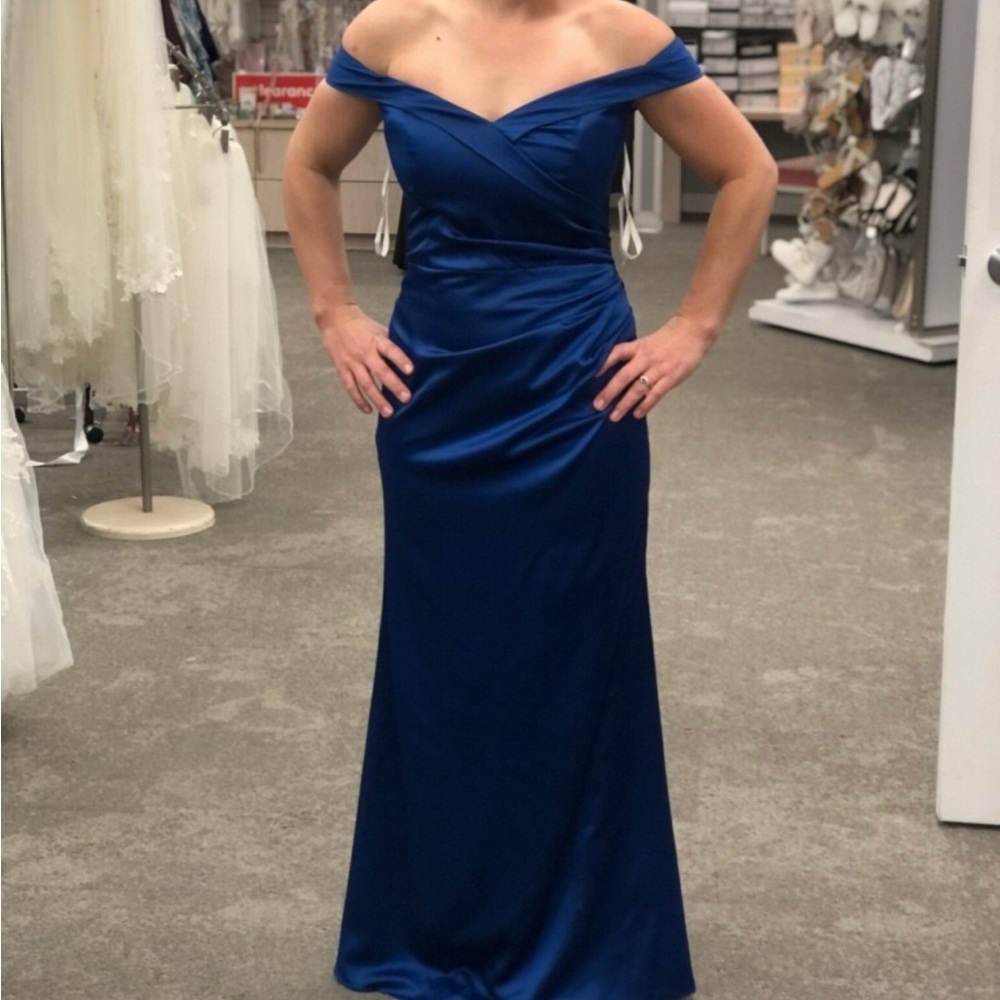 Brand new Bridesmaid dress never worn was to big for me.